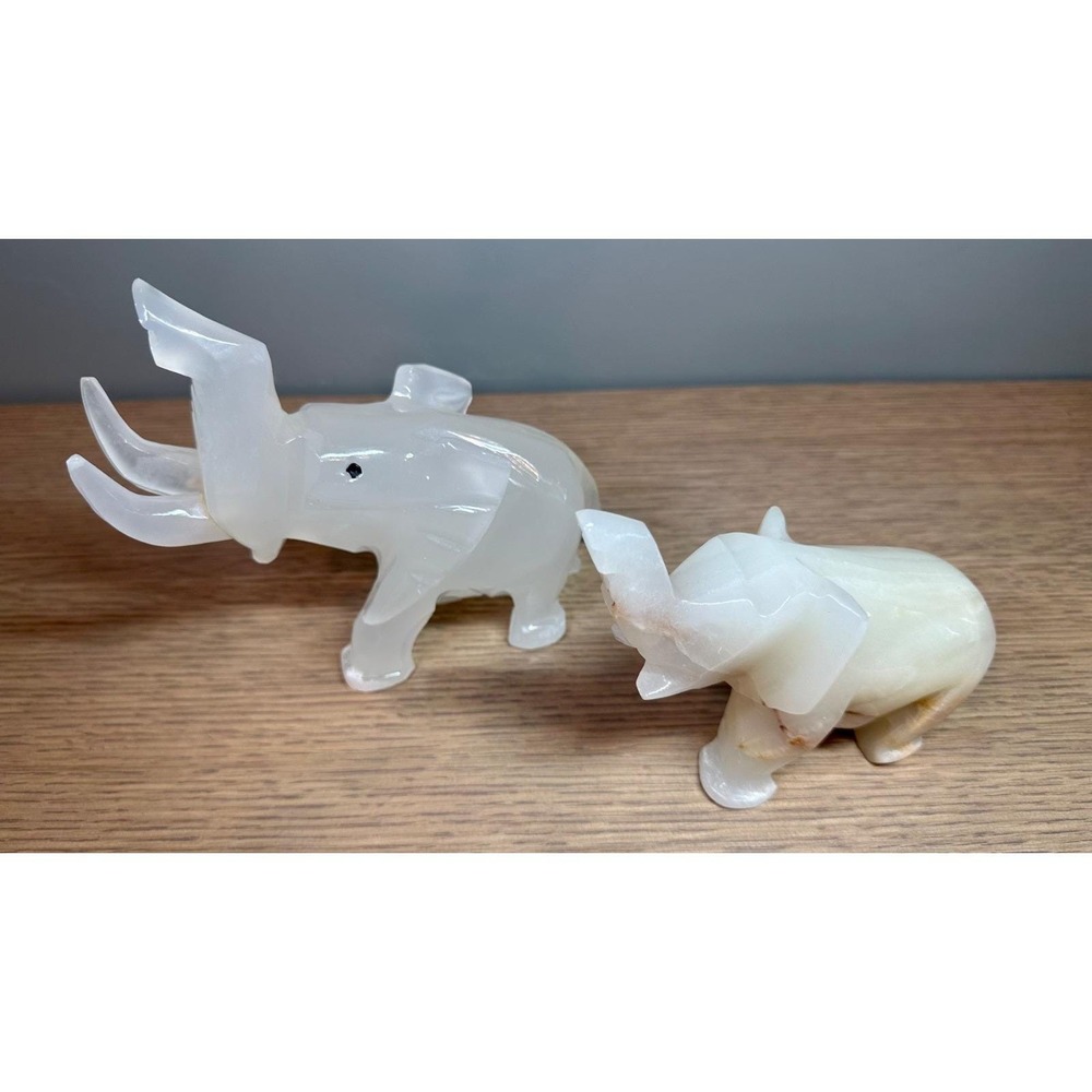 Vintage Hand Carved Stone Elephant Figurines Lot of 2 White Raised Trunk Decor